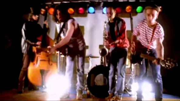 la banda Extrechinato y Tu en el videoclip